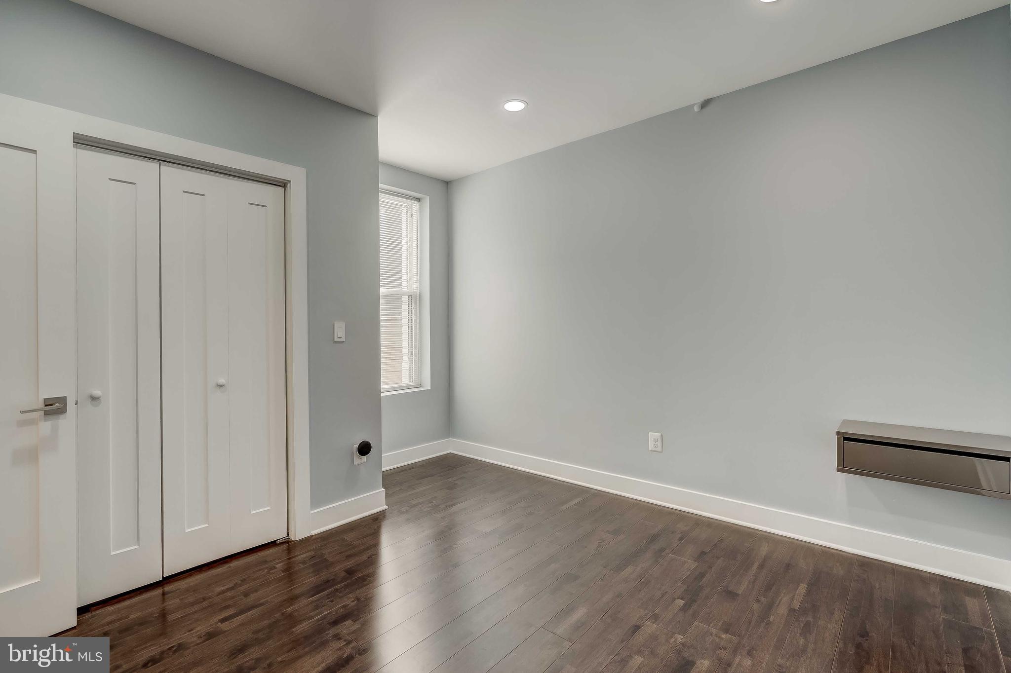 1605 F Street Northeast, Unit 2 Washington, DC 20002 - Photo 16 of 29 a view of an empty room with wooden floor