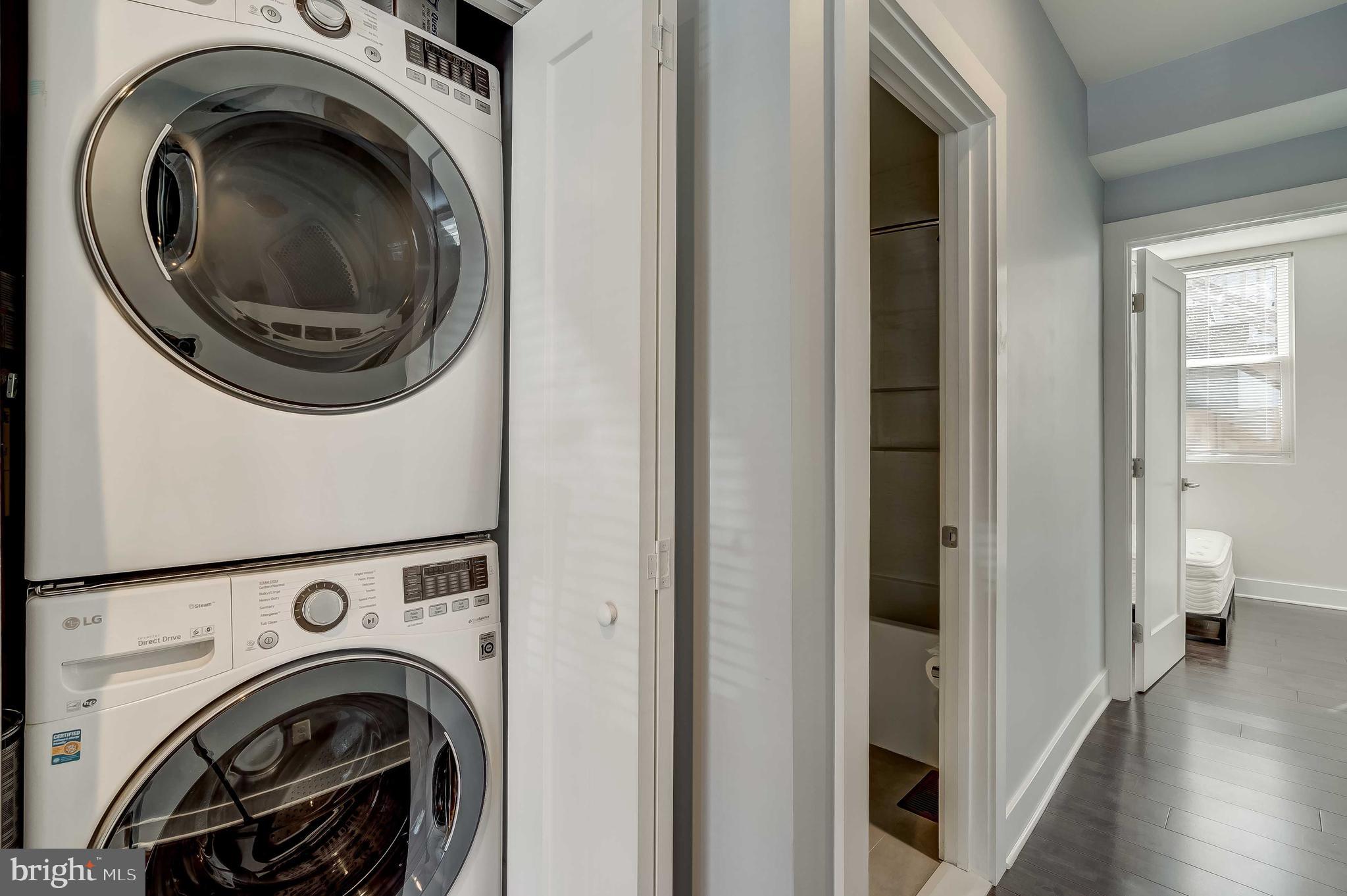1605 F Street Northeast, Unit 2 Washington, DC 20002 - Photo 19 of 29 a view of a hallway with washer and dryer