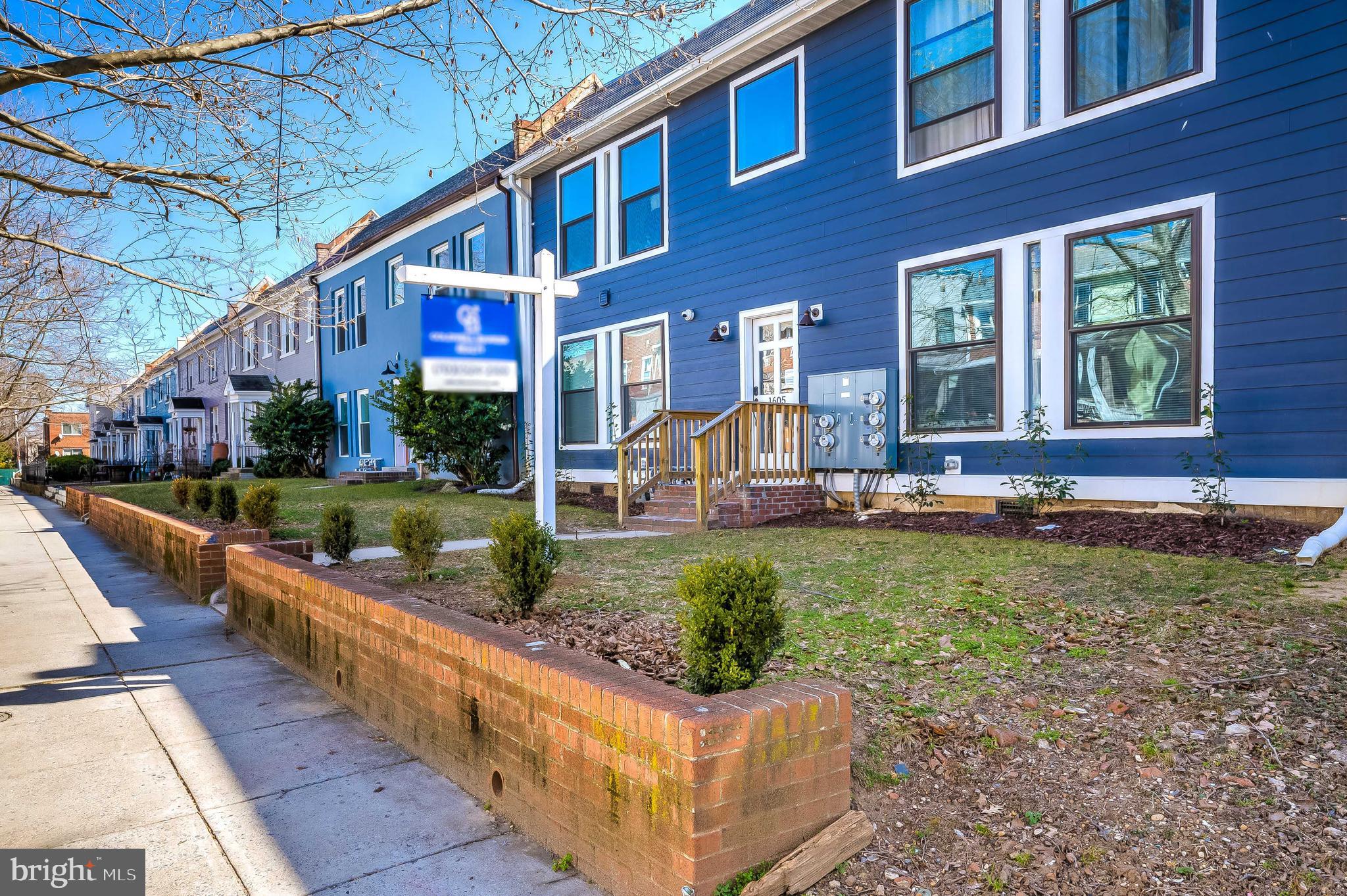 1605 F Street Northeast, Unit 2 Washington, DC 20002 - Photo 28 of 29 a front view of a house with garden