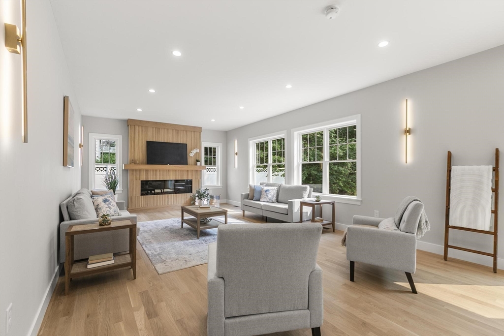 29 Beaverbrook Road Burlington, MA 01803 - Photo 15 of 42 a living room with furniture and a flat screen tv