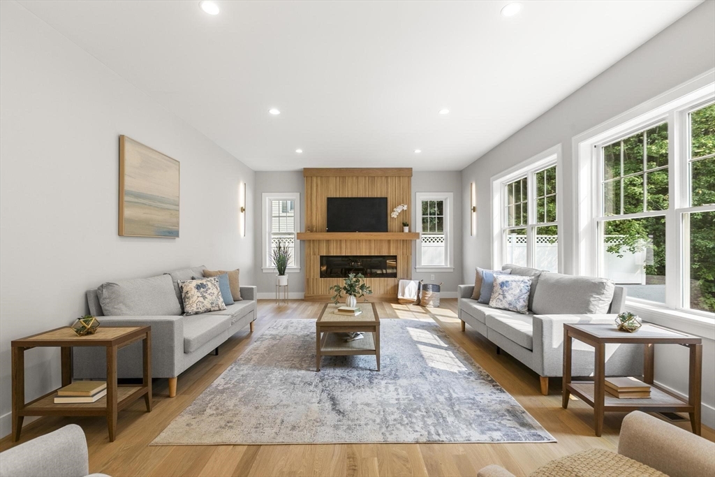 29 Beaverbrook Road Burlington, MA 01803 - Photo 16 of 42 a living room with furniture and a flat screen tv