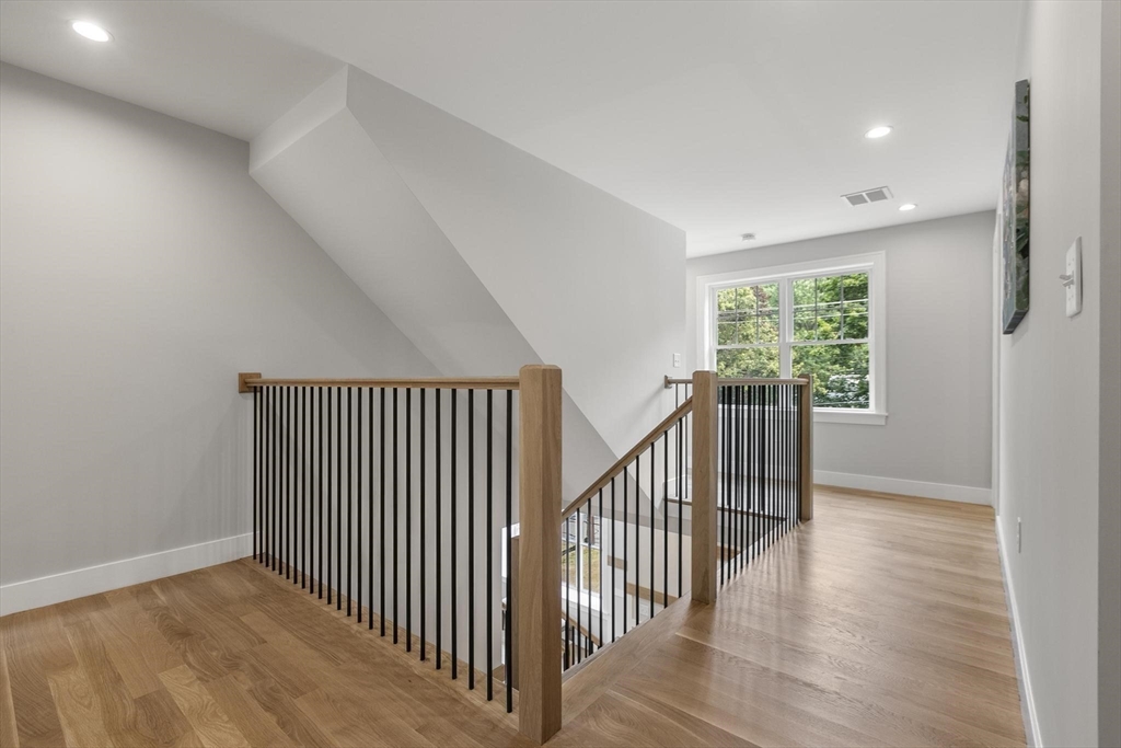 29 Beaverbrook Road Burlington, MA 01803 - Photo 18 of 42 a view of a hallway with wooden floor and windows