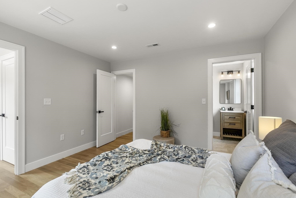 29 Beaverbrook Road Burlington, MA 01803 - Photo 28 of 42 a bedroom with a bed and a couch