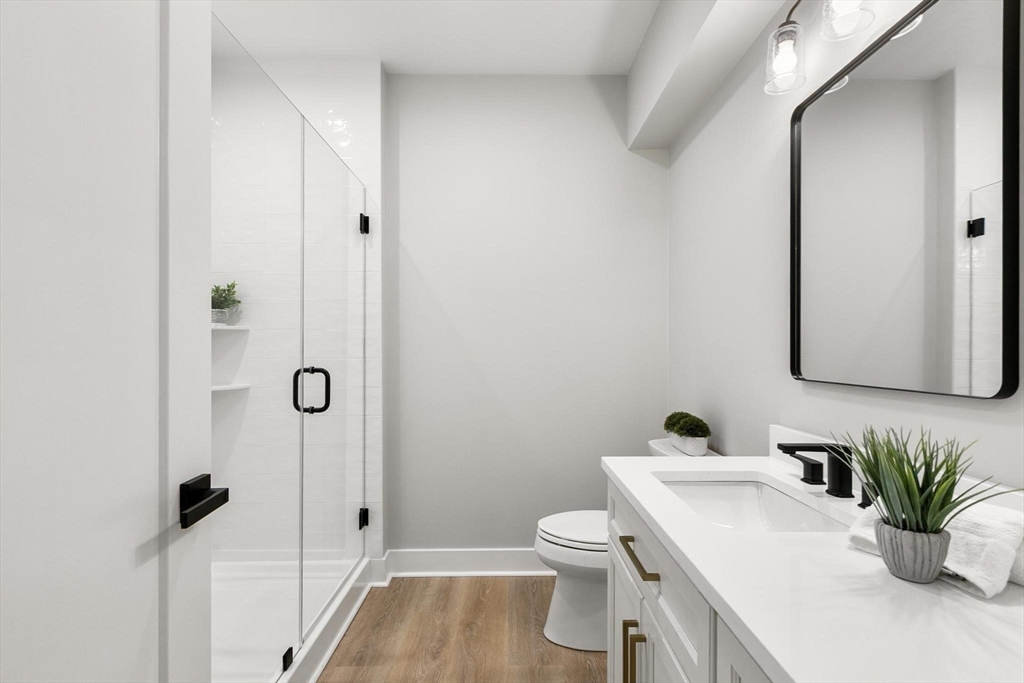 29 Beaverbrook Road Burlington, MA 01803 - Photo 37 of 42 a bathroom with a sink toilet and shower