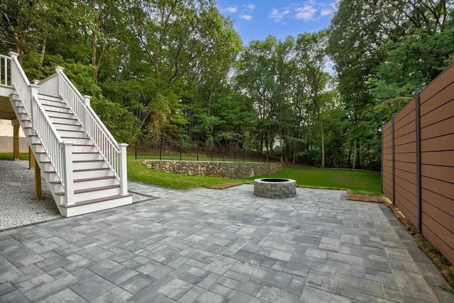 a view of a park with large trees
