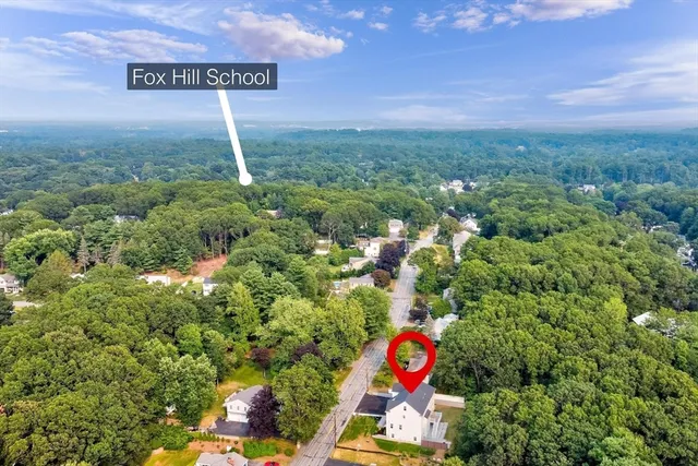 a sign that is sitting in the middle of a field