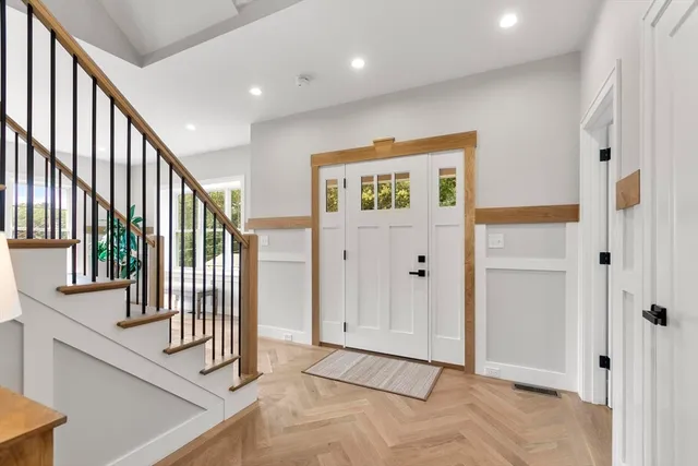 a view of an entryway with stairs