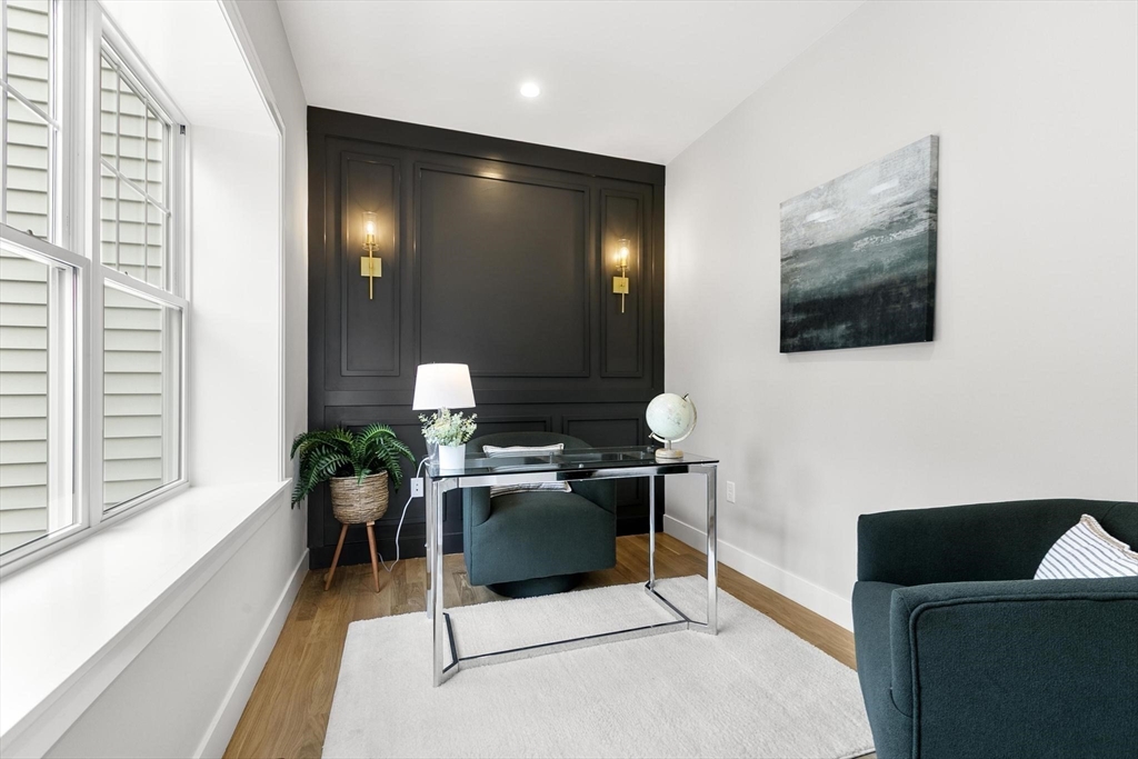 29 Beaverbrook Road Burlington, MA 01803 - Photo 6 of 42 a living room with furniture and a flat screen tv