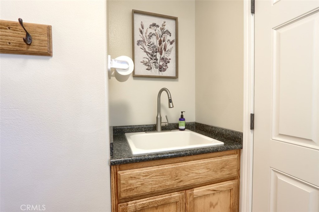 6097 Sherlock Road Midpines, CA 95345 - Photo 25 of 63 a close view of a sink and utility room