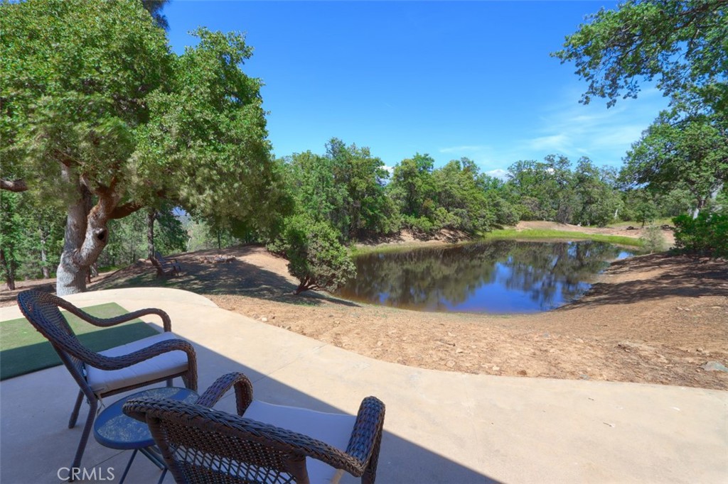 6097 Sherlock Road Midpines, CA 95345 - Photo 39 of 63 a view of backyard with swimming pool and outdoor seating