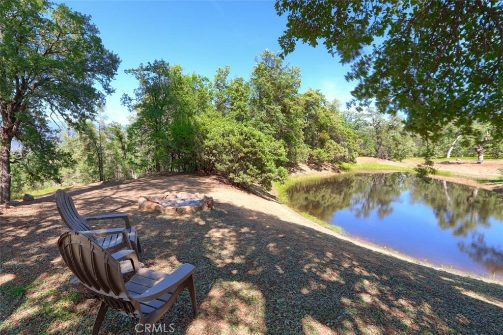 6097 Sherlock Road Midpines, CA 95345 - Photo 41 of 63 a view of a backyard with sitting area