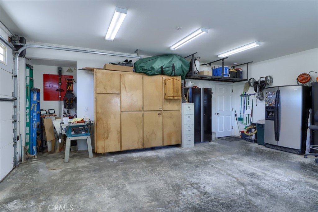 6097 Sherlock Road Midpines, CA 95345 - Photo 47 of 63 a view of a refrigerator in kitchen