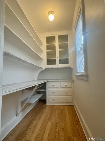 a view of an empty walk in closet