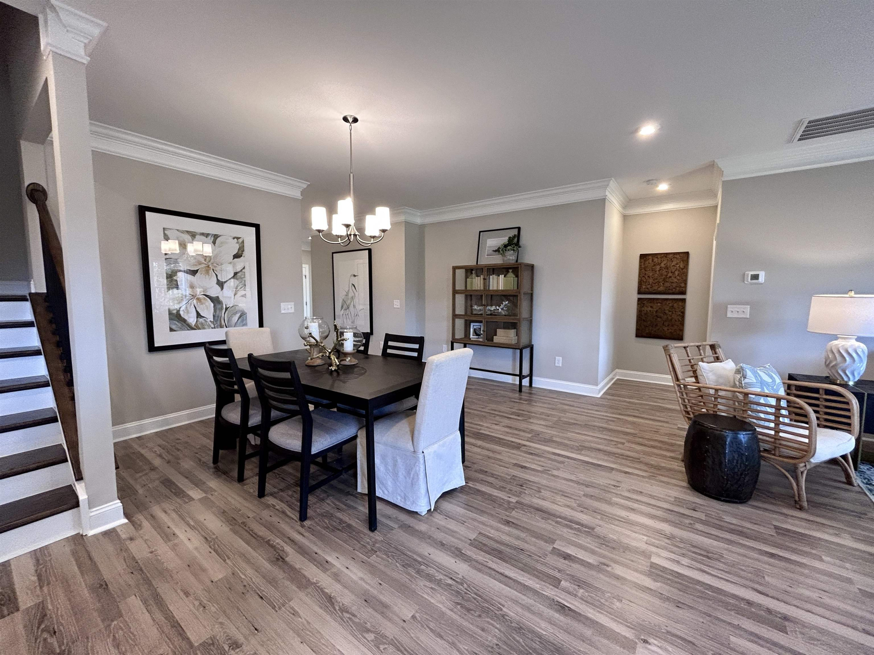 204 Kavanaugh Road Wake Forest, NC 27587 - Photo 14 of 53 a view of a dining room with furniture and wooden floor