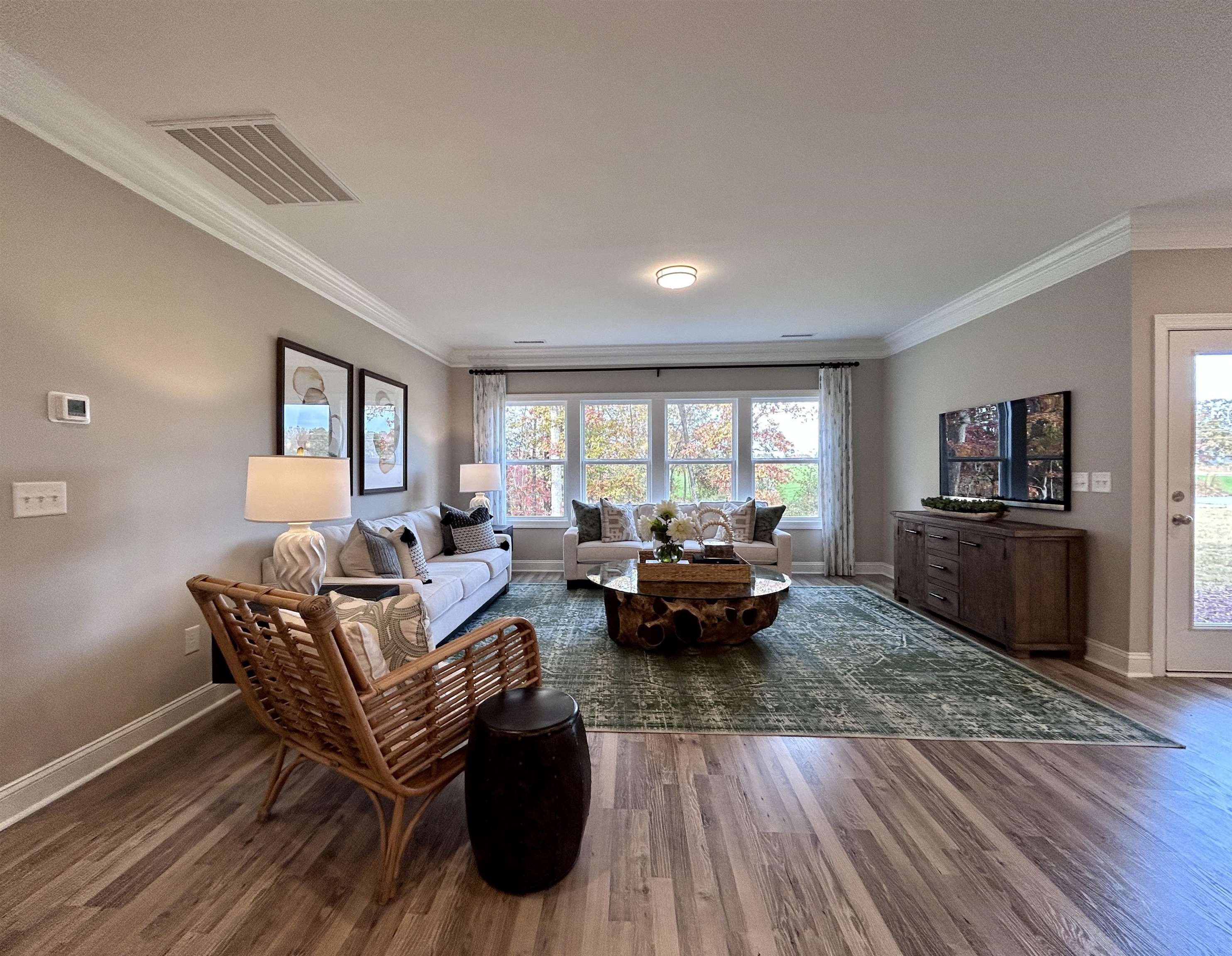204 Kavanaugh Road Wake Forest, NC 27587 - Photo 16 of 53 a living room with furniture and a wooden floor