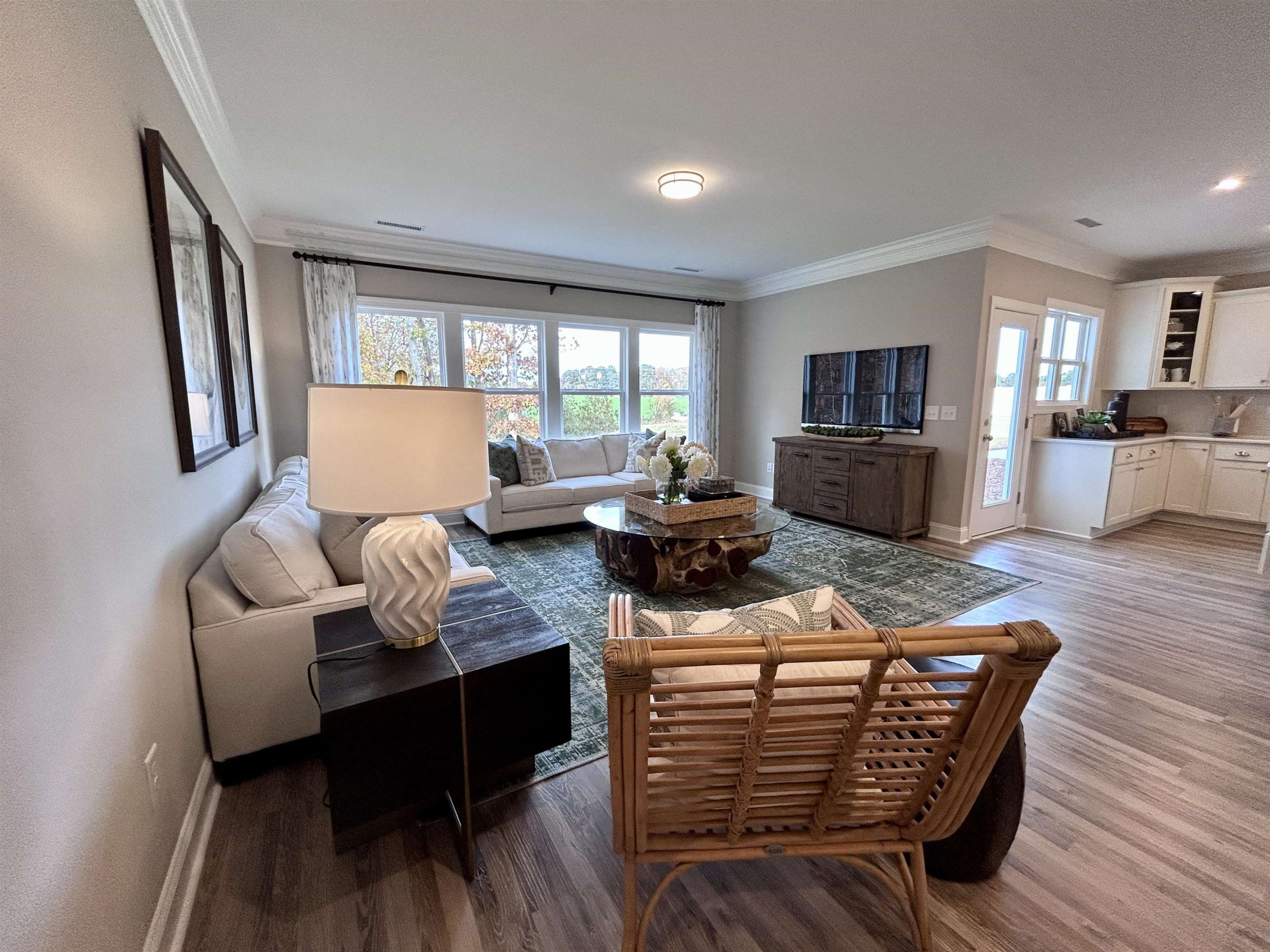 204 Kavanaugh Road Wake Forest, NC 27587 - Photo 17 of 53 a living room with furniture fireplace and a flat screen tv
