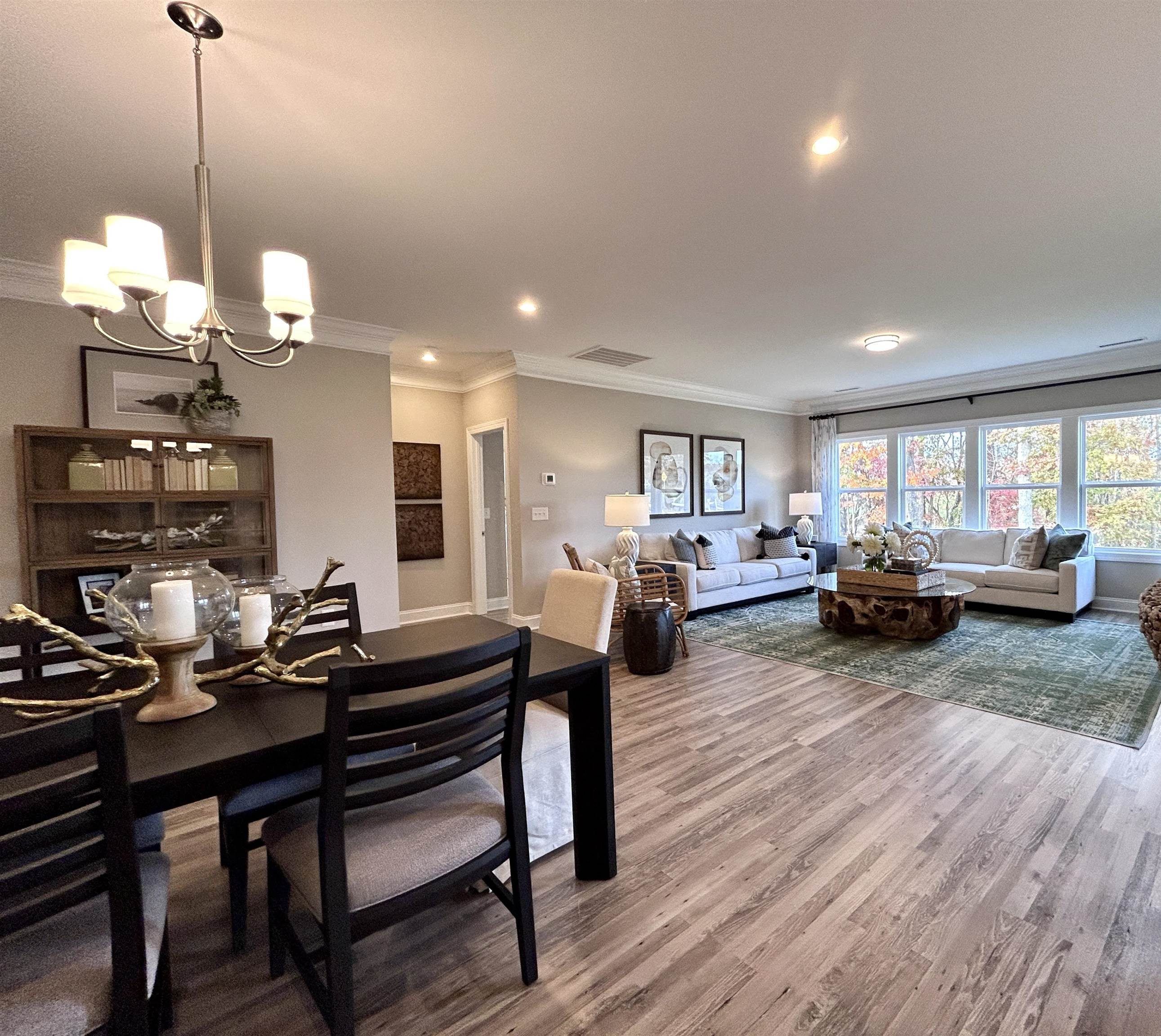 204 Kavanaugh Road Wake Forest, NC 27587 - Photo 19 of 53 a living room with furniture a couch and wooden floor