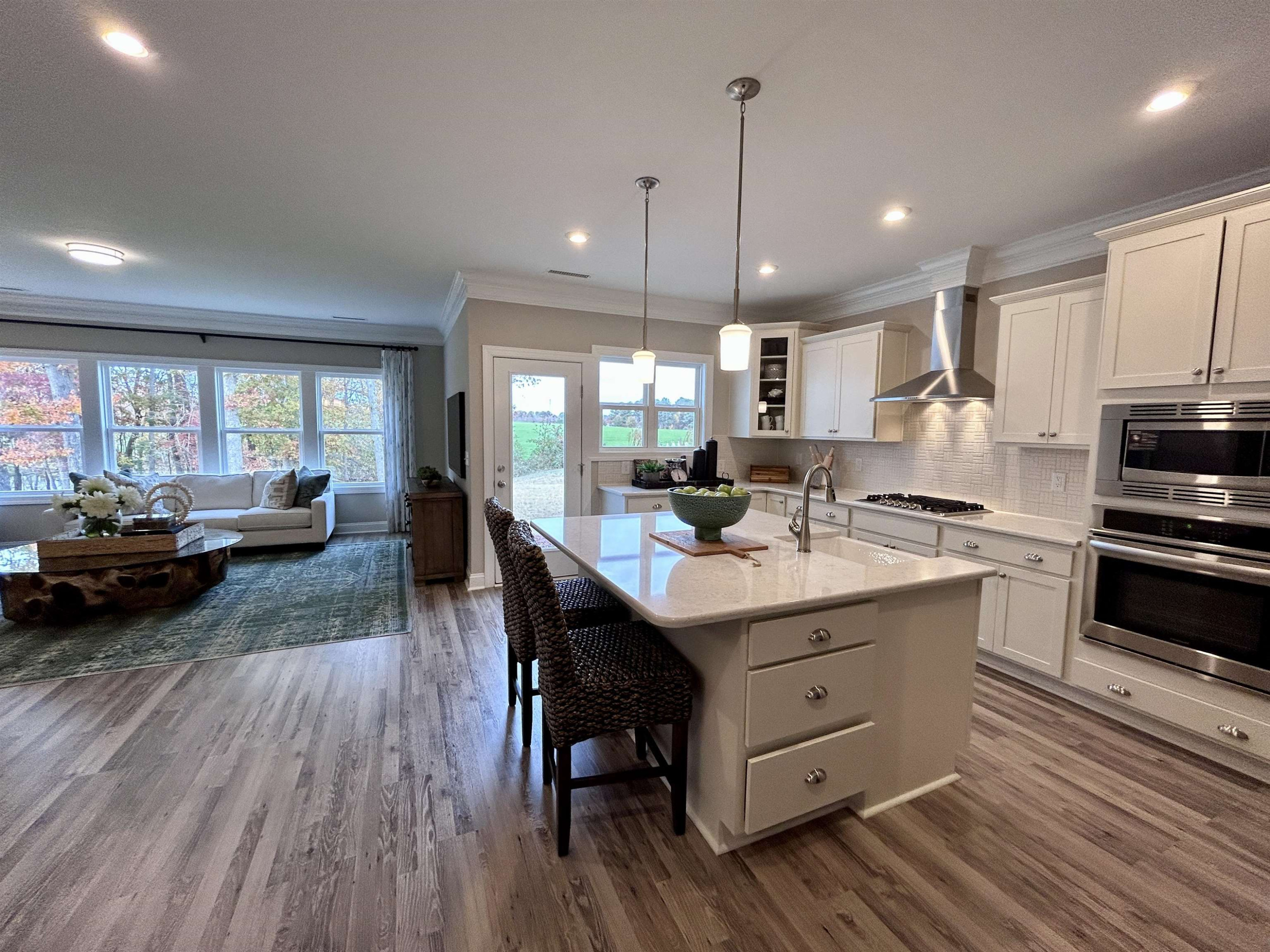 204 Kavanaugh Road Wake Forest, NC 27587 - Photo 37 of 53 a kitchen with a table chairs sink and cabinets