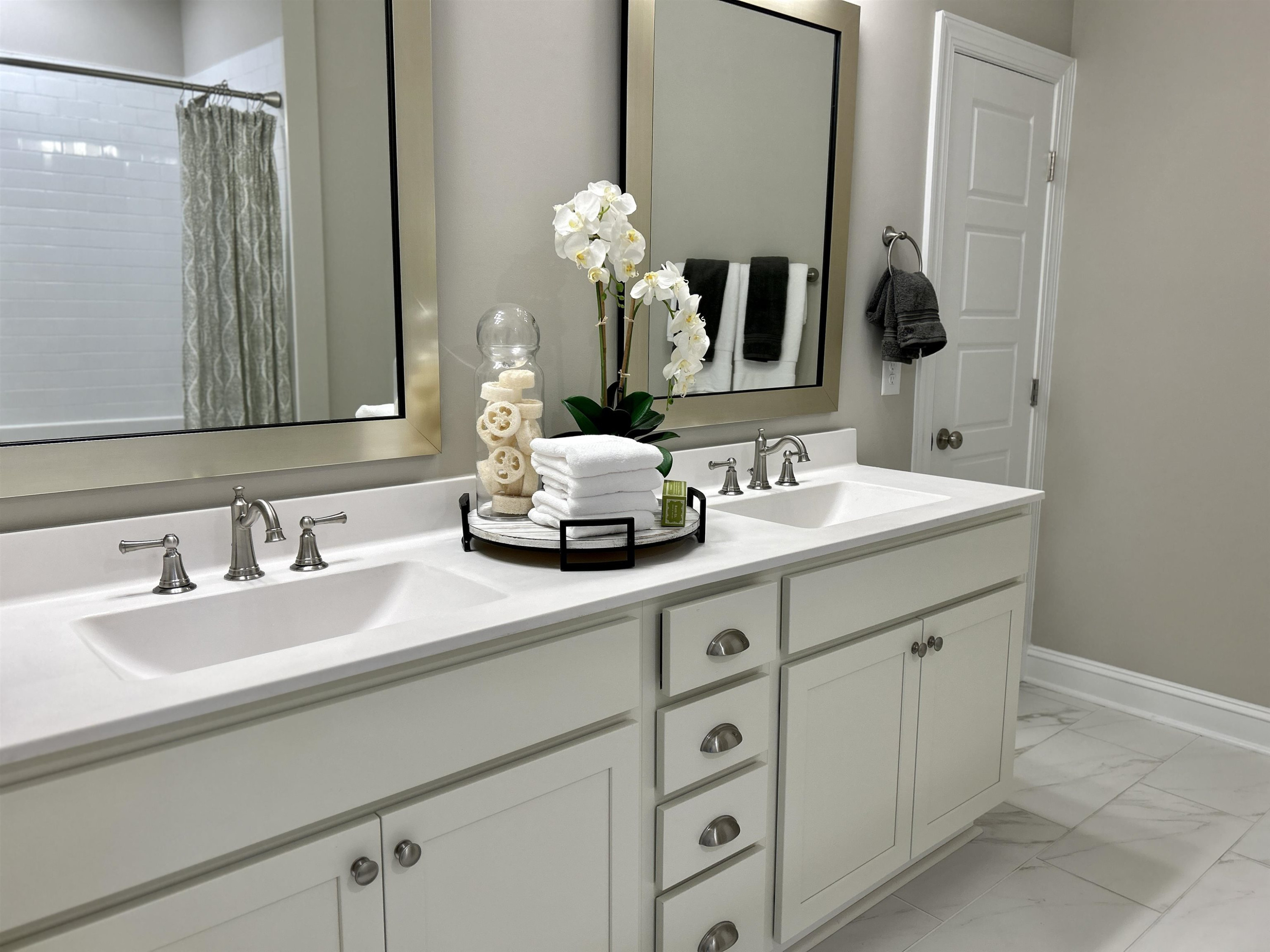 204 Kavanaugh Road Wake Forest, NC 27587 - Photo 44 of 53 a bathroom with a double vanity sink and a mirror