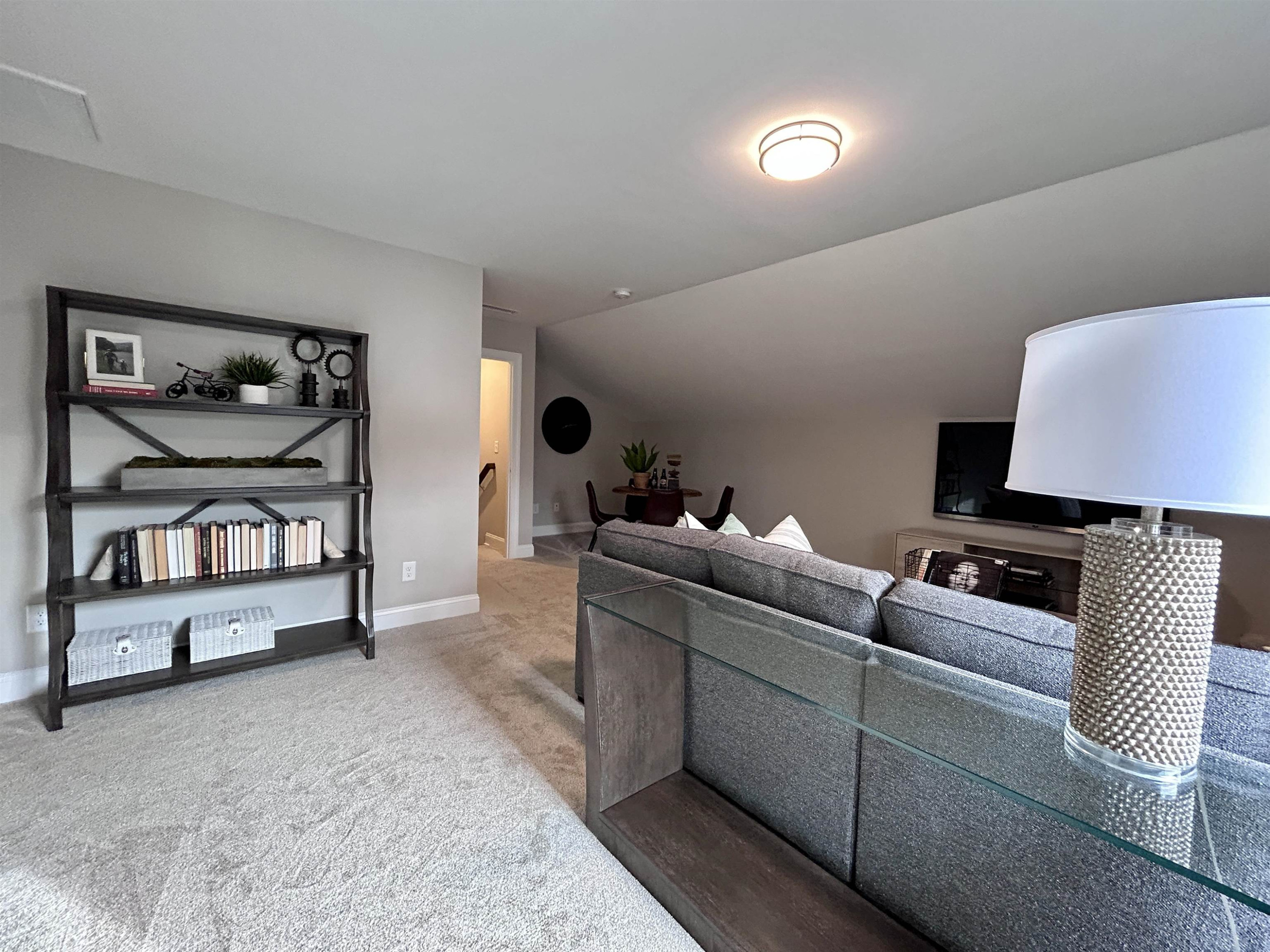 204 Kavanaugh Road Wake Forest, NC 27587 - Photo 47 of 53 a living room with furniture and a lamp
