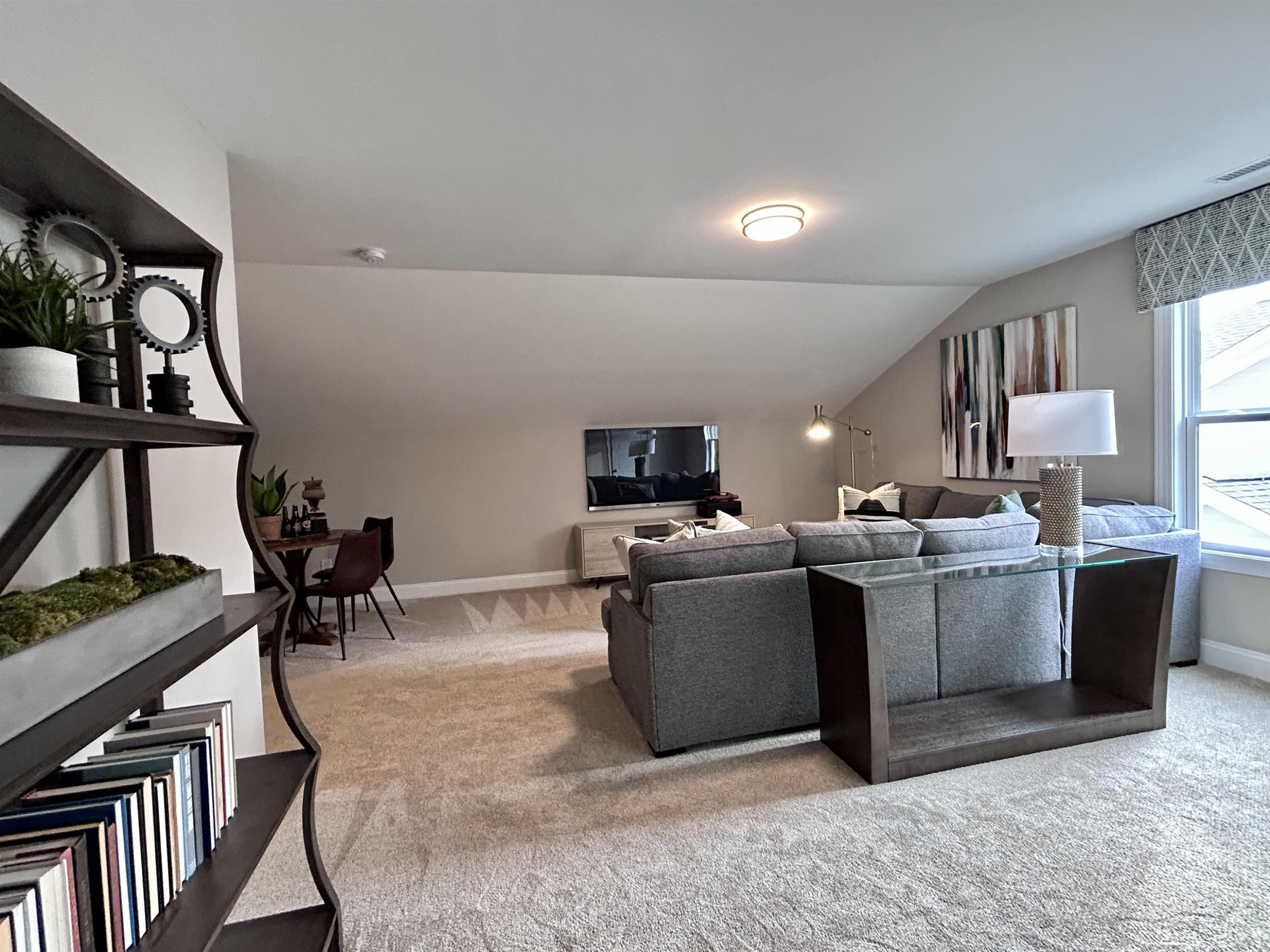 204 Kavanaugh Road Wake Forest, NC 27587 - Photo 49 of 53 a view of kitchen with microwave a stove and furniture