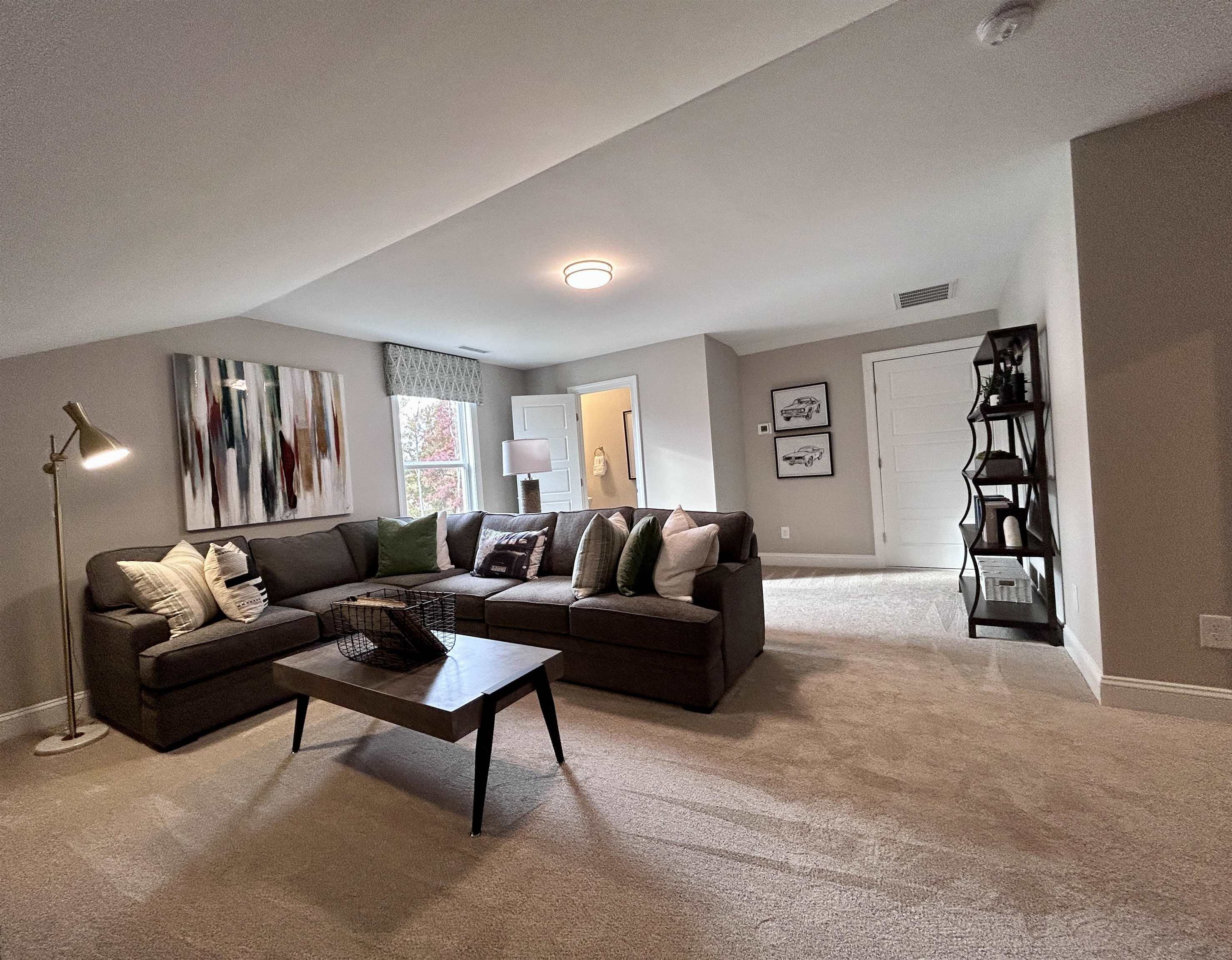 204 Kavanaugh Road Wake Forest, NC 27587 - Photo 51 of 53 a living room with furniture and a couch