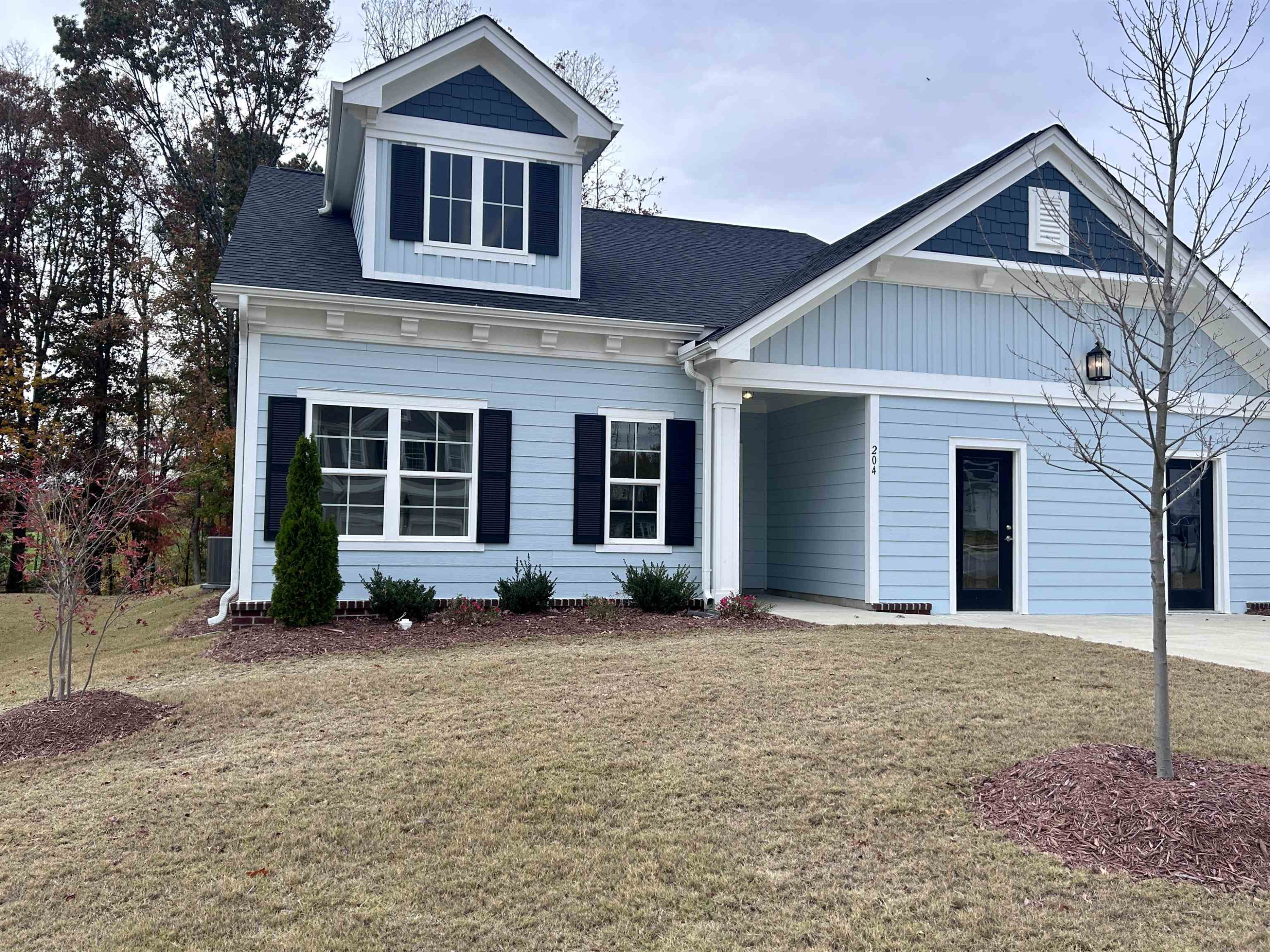 204 Kavanaugh Road Wake Forest, NC 27587 - Photo 53 of 53 a view of a house with a yard and large tree