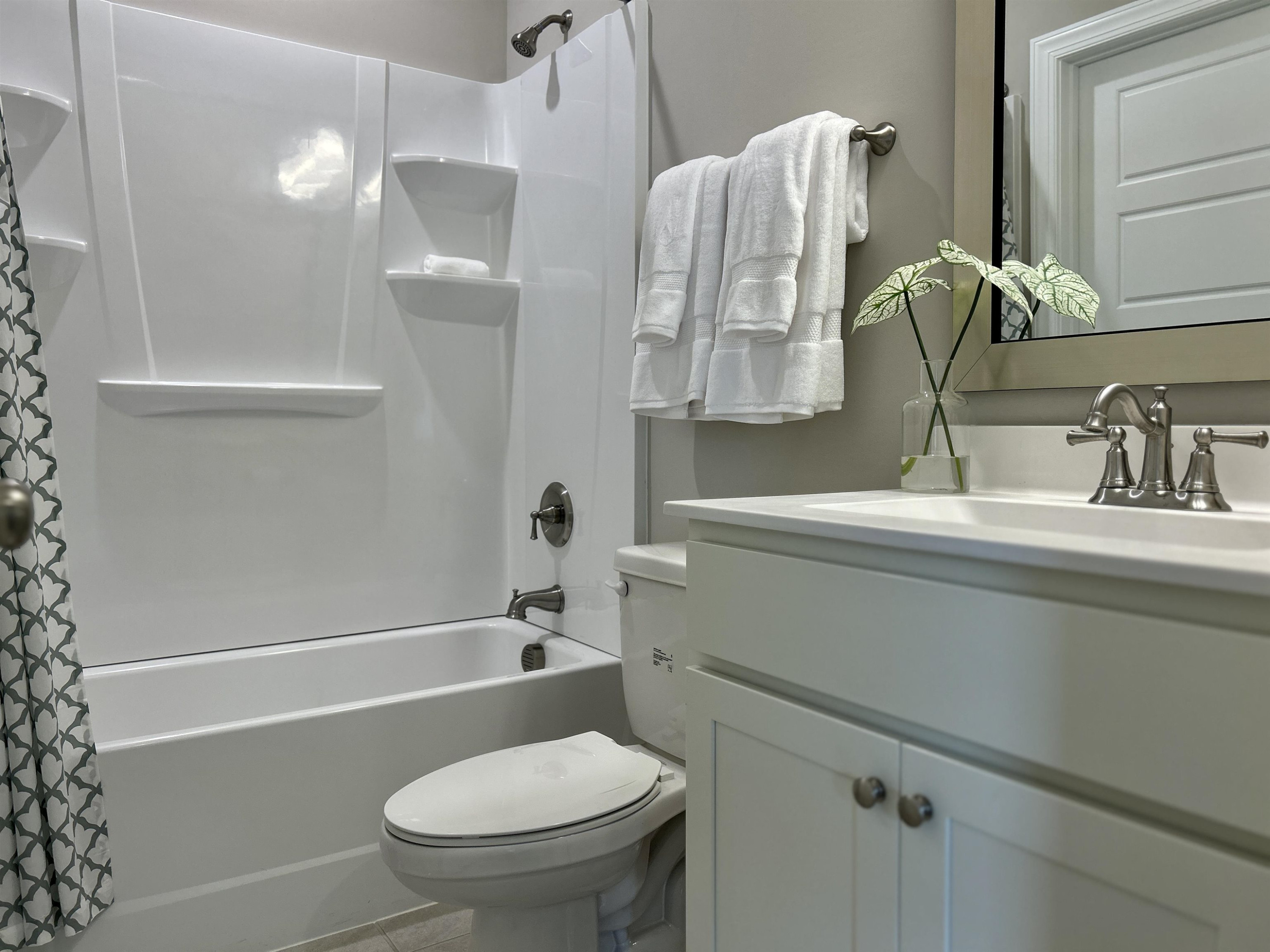 204 Kavanaugh Road Wake Forest, NC 27587 - Photo 10 of 53 a bathroom with a sink a toilet and shower