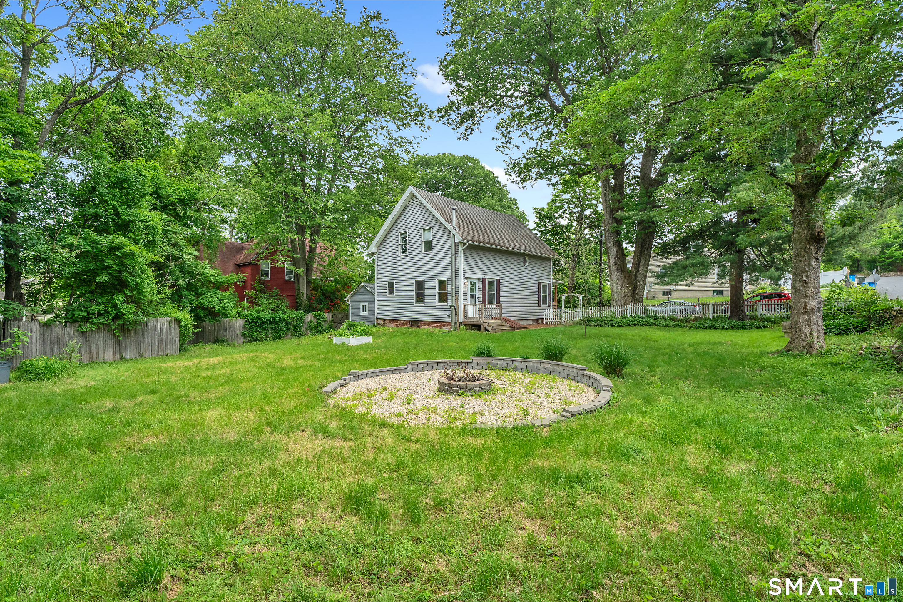 75 Summit Street Norwich, CT 06360 - Photo 39 of 40 a house view with a garden space
