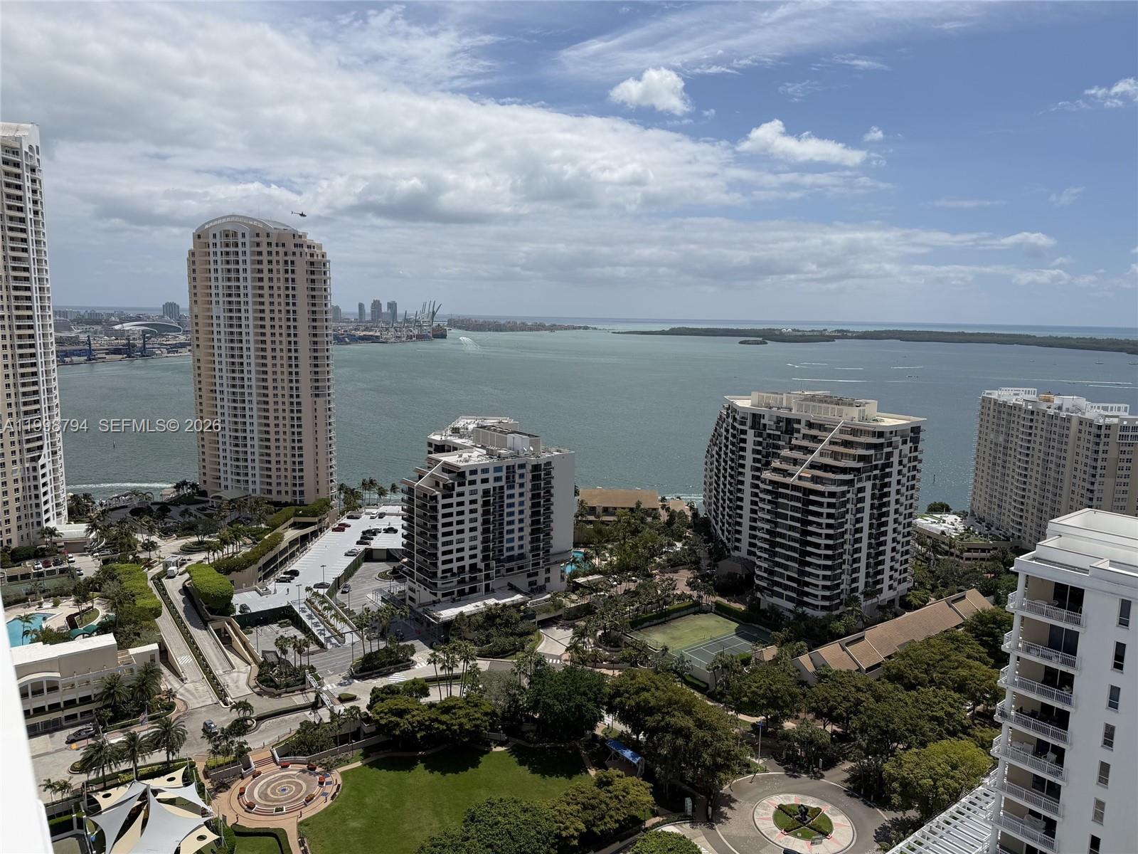 801 Brickell Key Boulevard, Unit 3207 Miami, FL 33131 - Photo 19 of 67 a view of a city with tall buildings