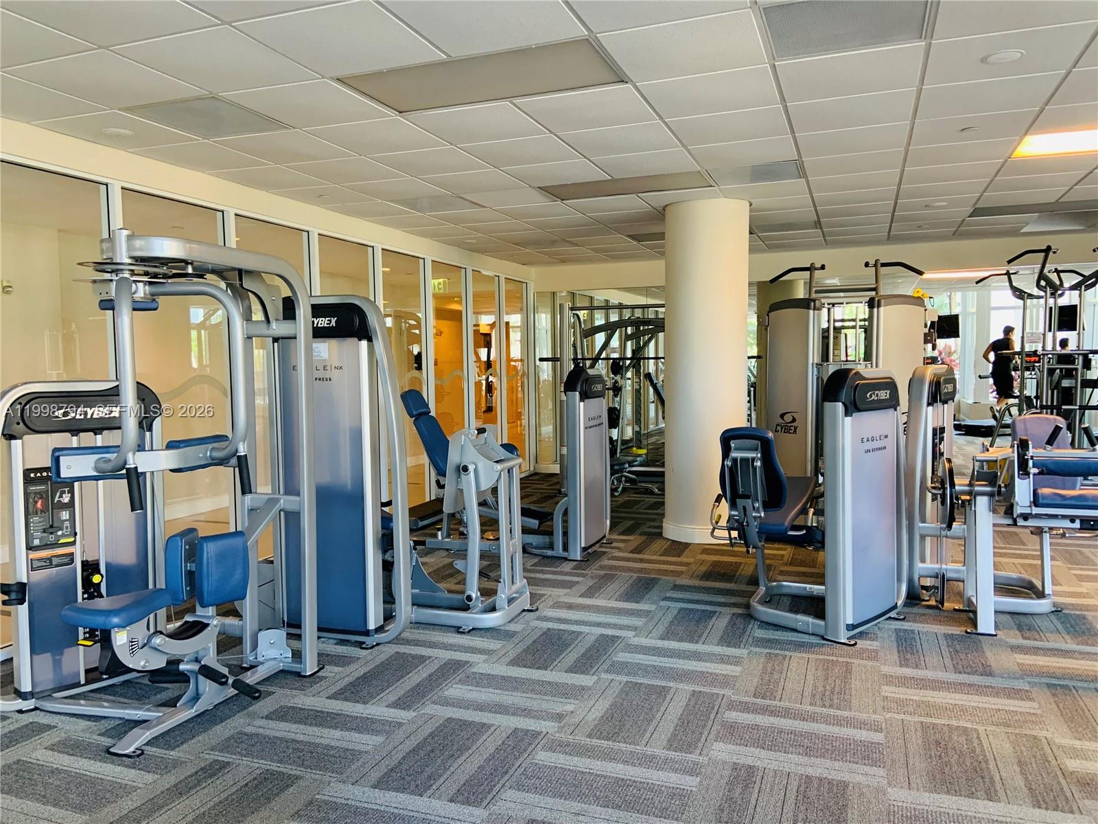 801 Brickell Key Boulevard, Unit 3207 Miami, FL 33131 - Photo 38 of 67 a view of a room with gym equipment