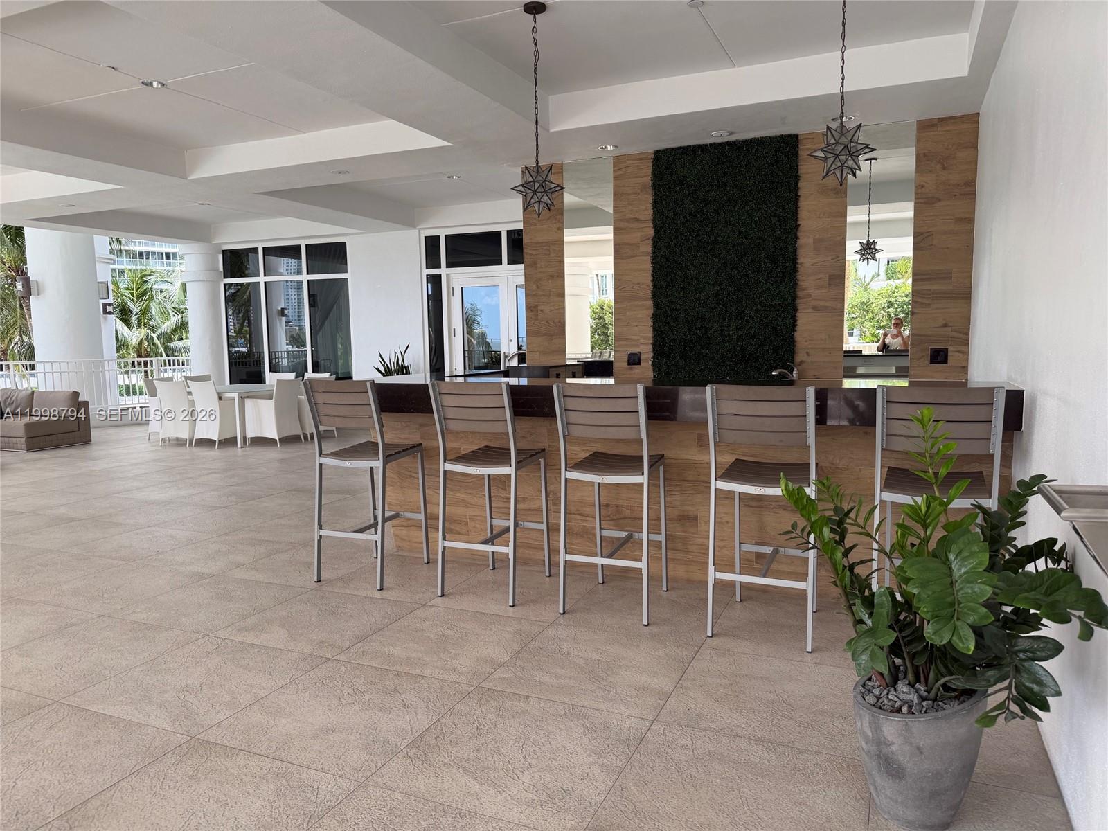 801 Brickell Key Boulevard, Unit 3207 Miami, FL 33131 - Photo 66 of 67 a view of a livingroom with furniture window and outdoor space
