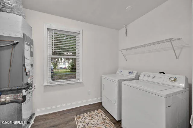 a bathroom with a sink toilet and a mirror