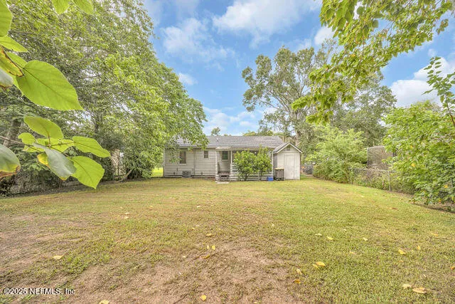 a view of a house with a swimming pool