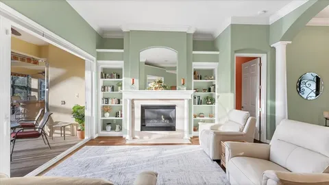 a living room with furniture and a table