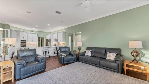 a living room with furniture and a table