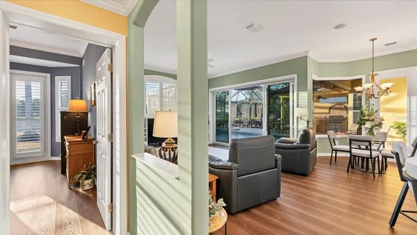 a living room with furniture and a table