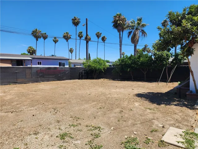 a view of swimming pool with a yard