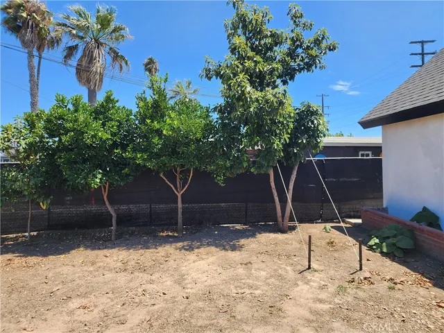 a house with a tree in the background