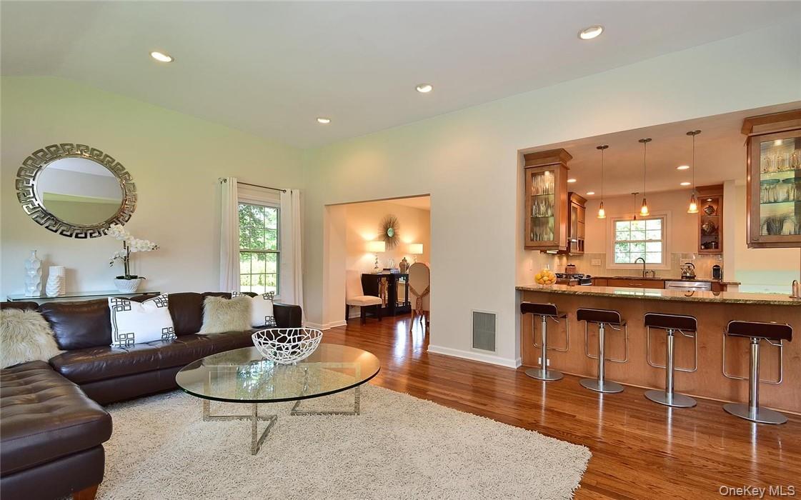9 Franklin Avenue Rye, NY 10580 - Photo 7 of 35 a living room with granite countertop kitchen and a dining table