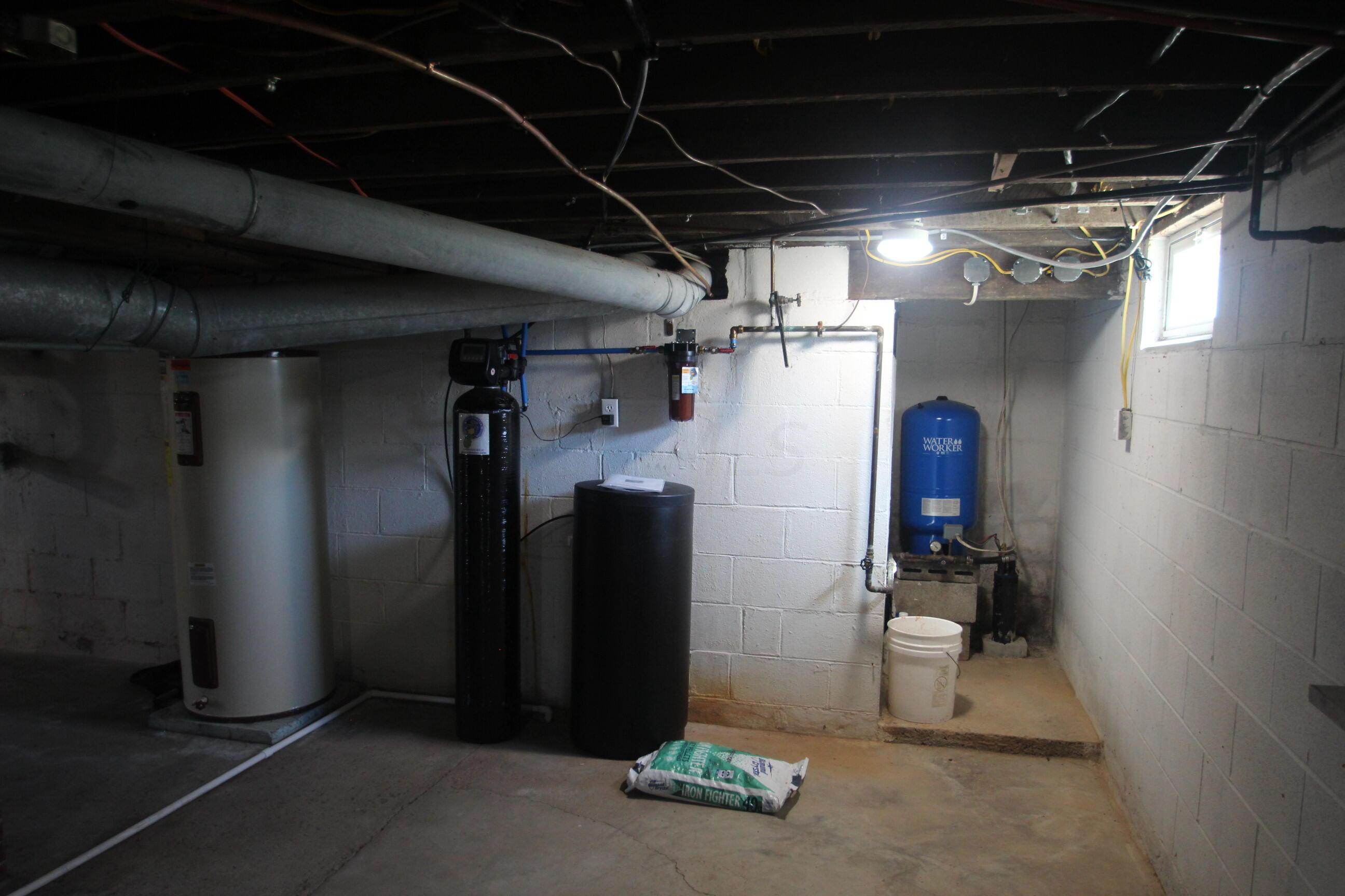 540 Newmans-Cardington Road West Prospect, OH 43342 - Photo 40 of 41 Well casing, pressure tank, water filtration and softener, and electric hot water heater.