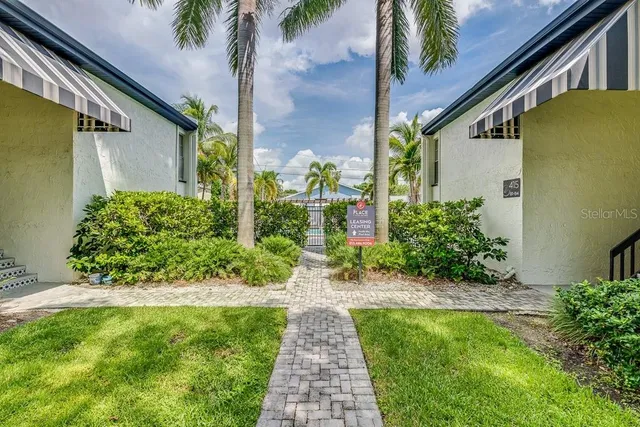 a view of a back yard of the house