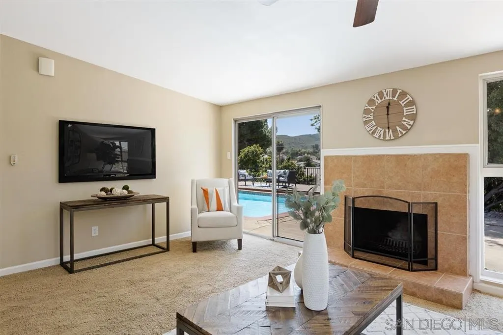 13916 Frame Road Poway, CA 92064 - Photo 11 of 19 a living room with furniture and a fireplace