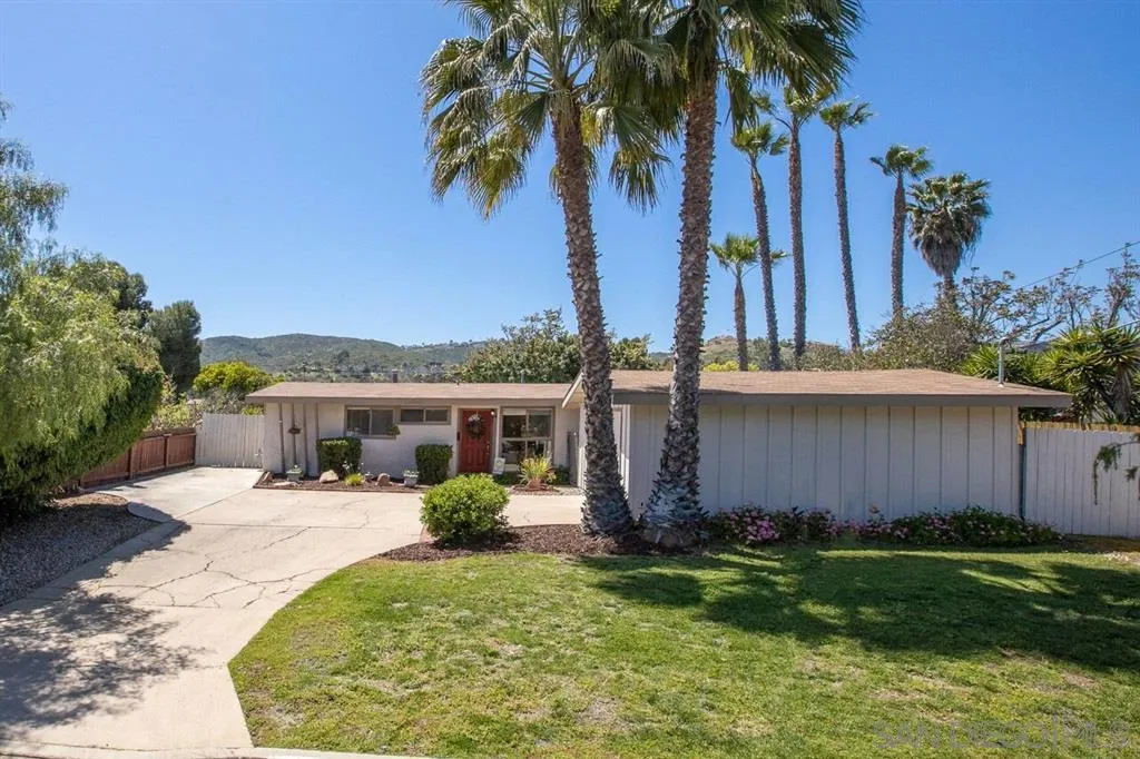 13916 Frame Road Poway, CA 92064 - Photo 18 of 19 a front view of a house with garden and trees