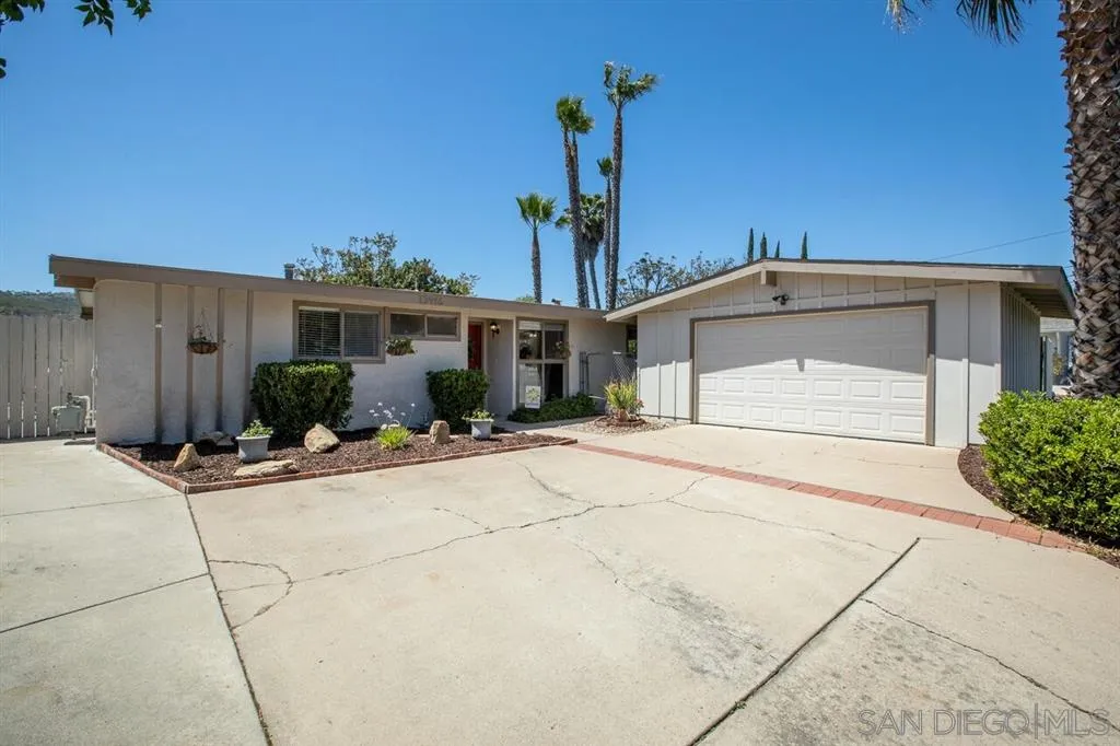 13916 Frame Road Poway, CA 92064 - Photo 19 of 19 a front view of a house with a yard and garage