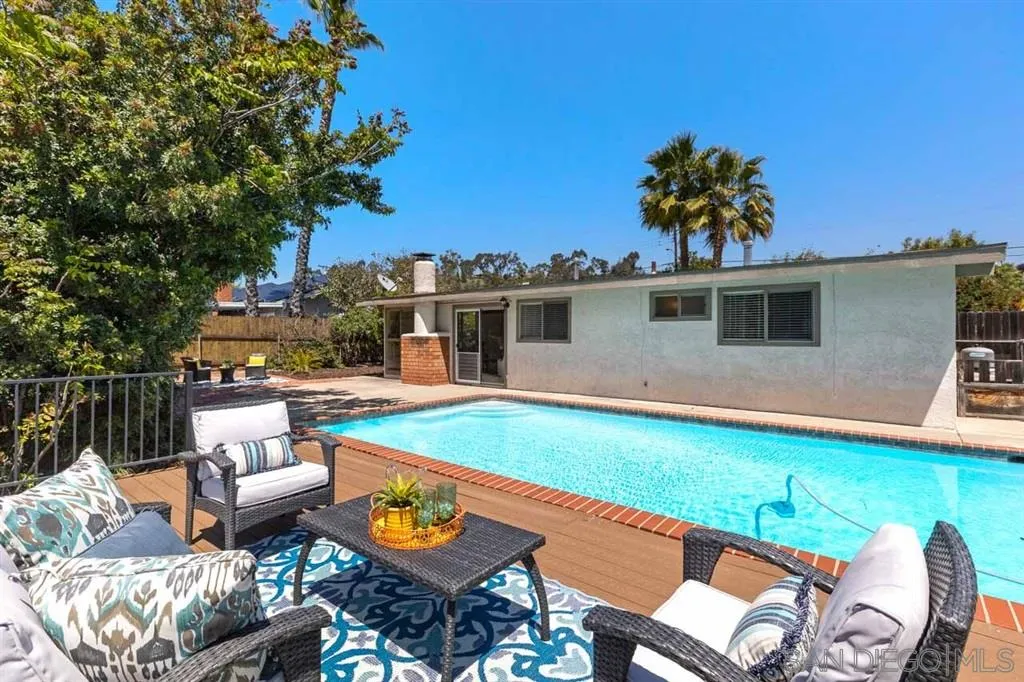 13916 Frame Road Poway, CA 92064 - Photo 4 of 19 a view of a house with pool and chairs