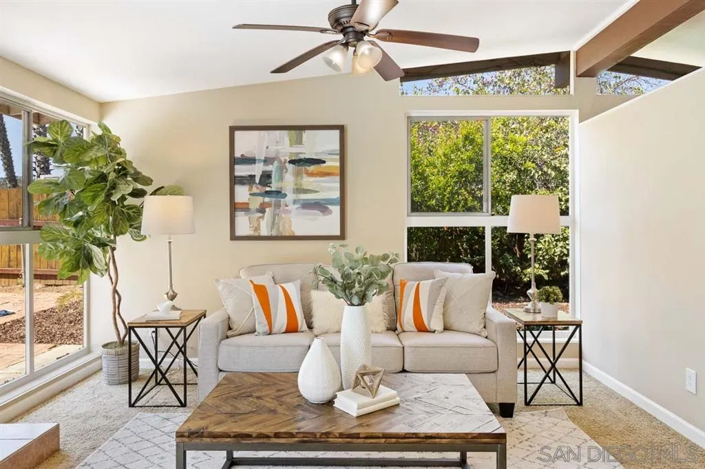 13916 Frame Road Poway, CA 92064 - Photo 10 of 19 a living room with furniture and a large window