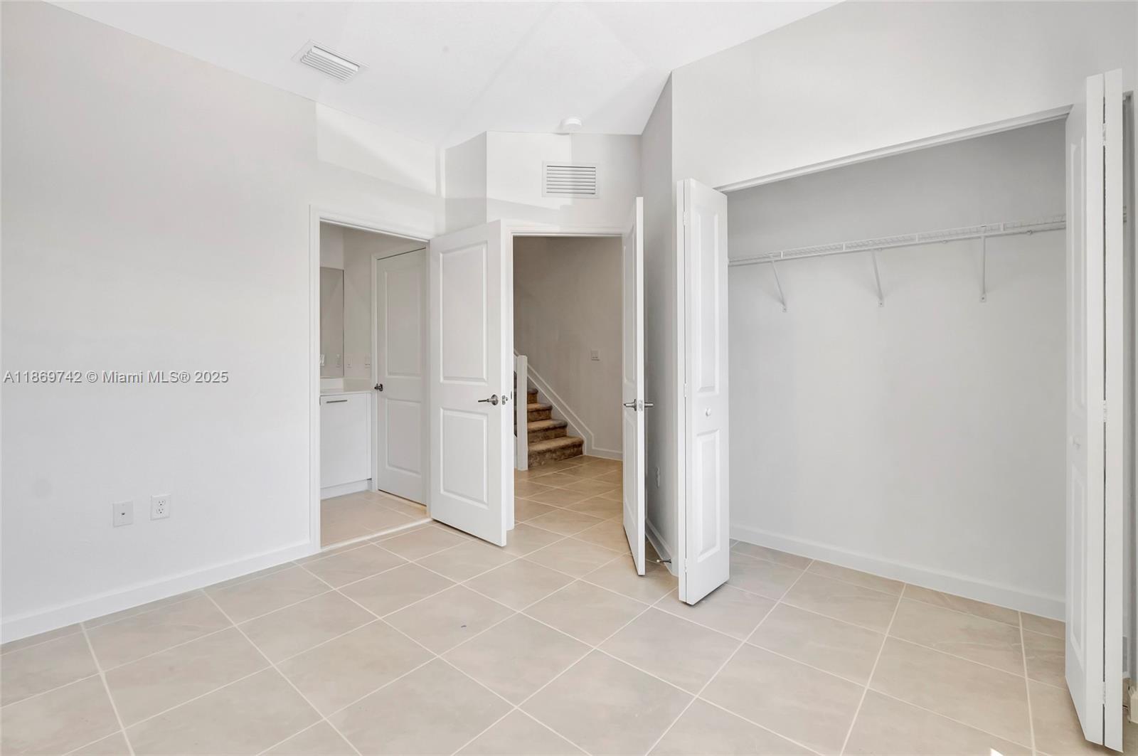 12206 Northwest 23rd Avenue Miami, FL 33167 - Photo 11 of 25 a view of an empty room