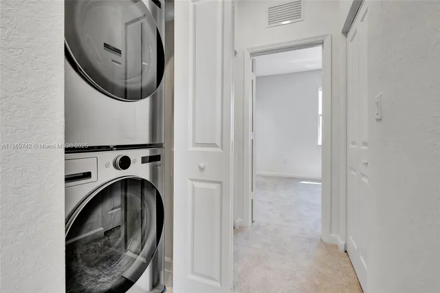 a view of a washer and dryer in a bathroom