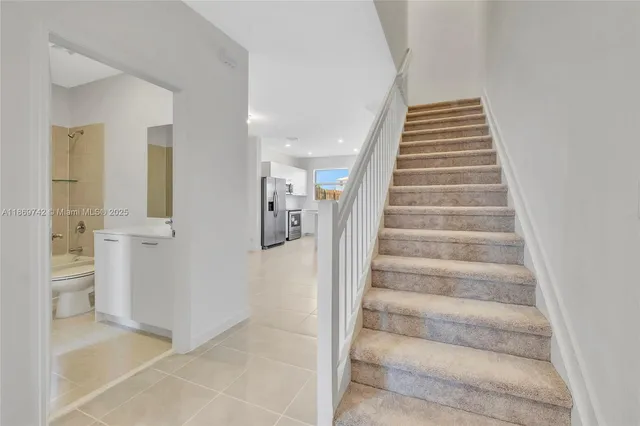 a view of an entryway with staircase